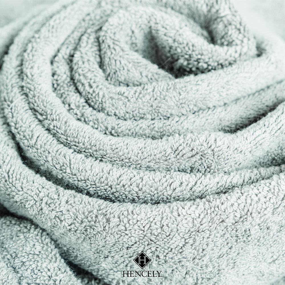 Close-up of light green Turkish cotton bath sheet, showing soft, absorbent texture and premium weave quality.