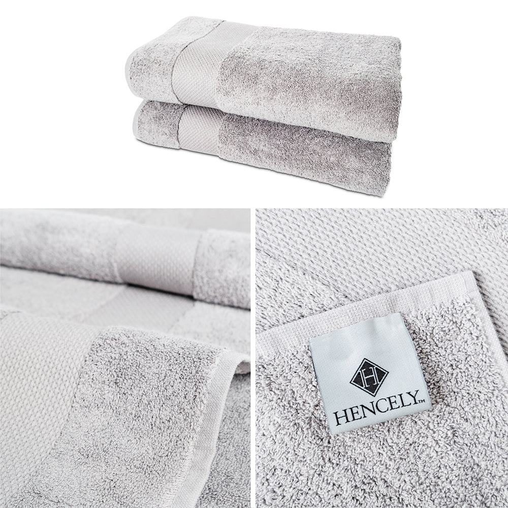 Luxury bath sheet set of 2 in silver, oversized 35x64 inch cotton towels, folded neatly on display