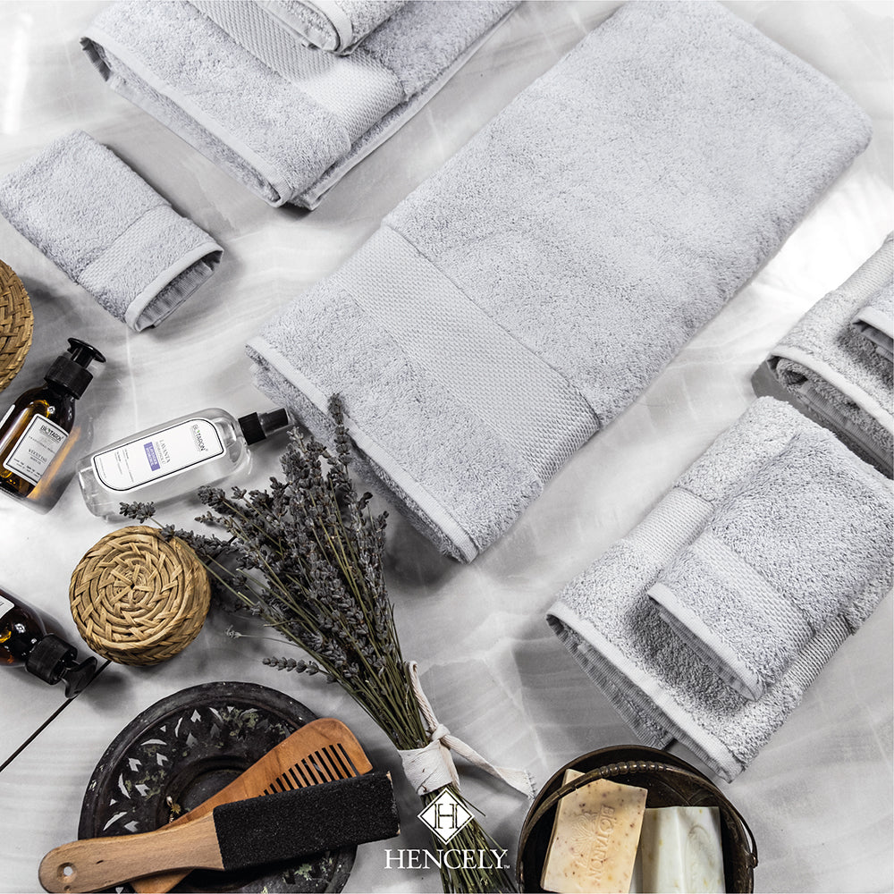 Luxury silver bath sheet set displayed in a modern bathroom setting, perfect for spa or home use.