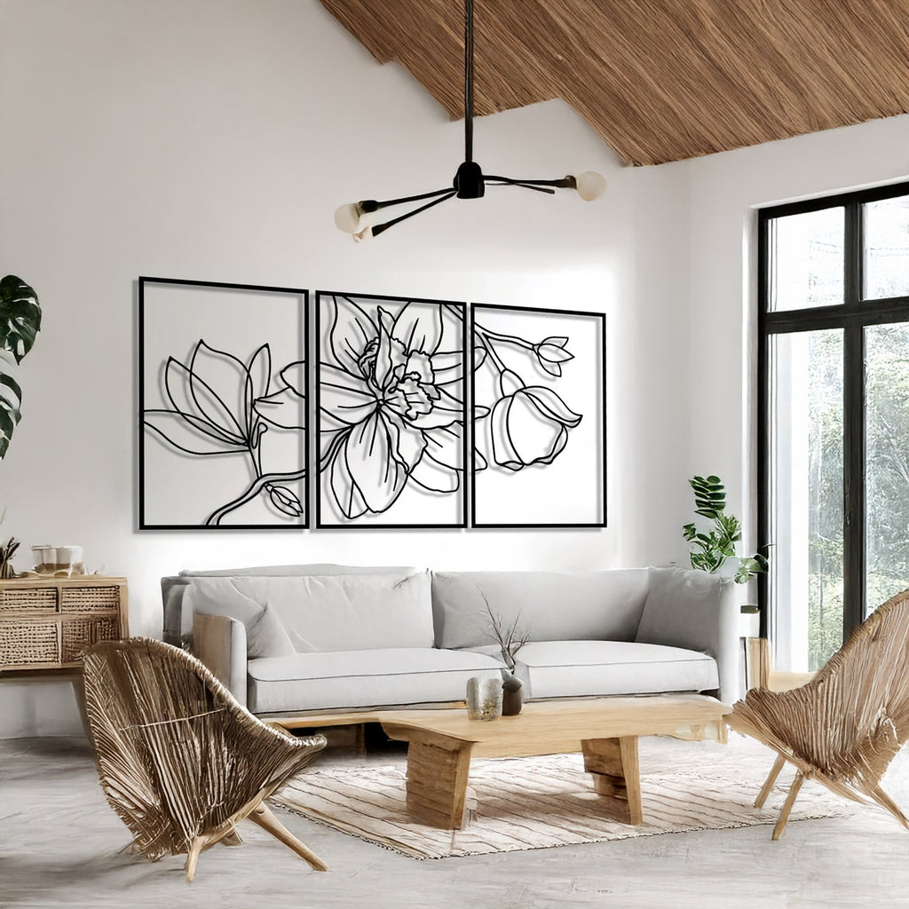 Black botanical line design metal wall art, 3 panels hanging on beige wall