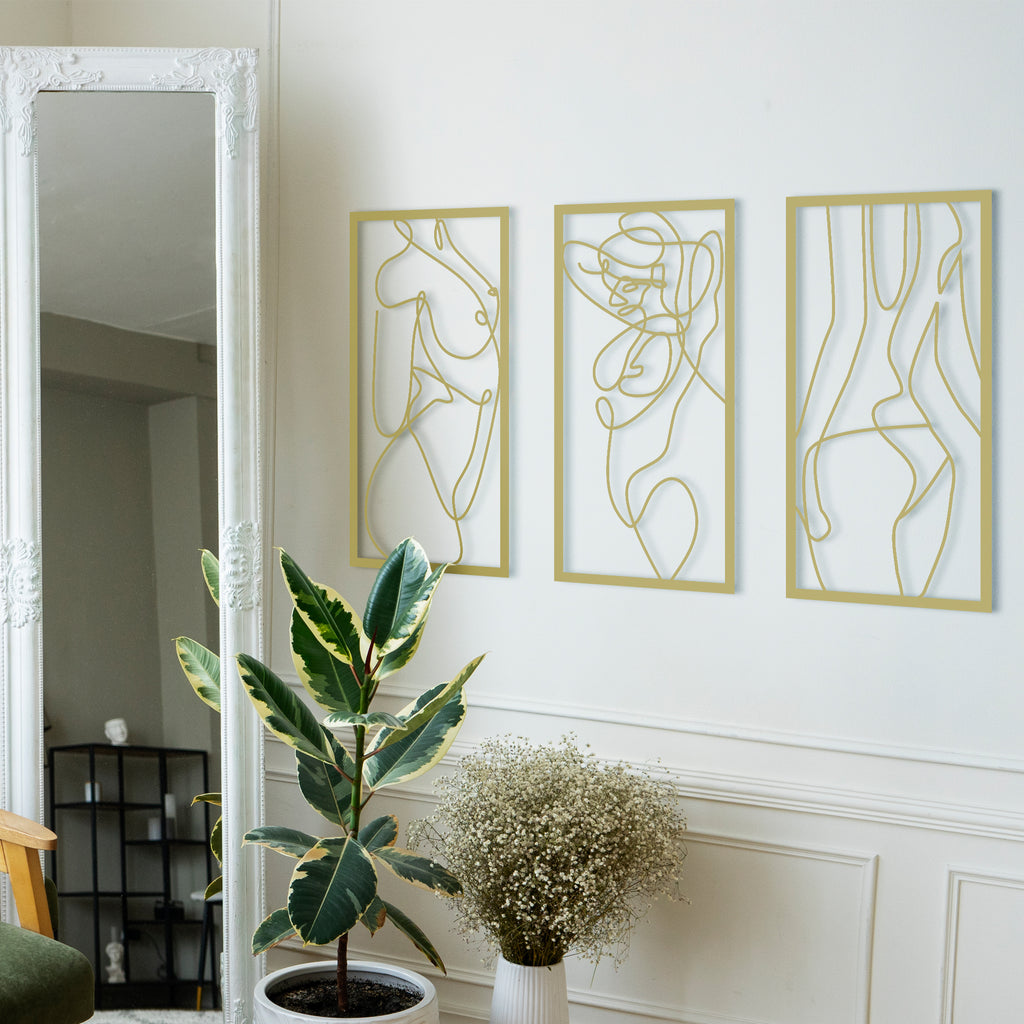 Modern abstract female line art wall decor in gold panels, minimalist style