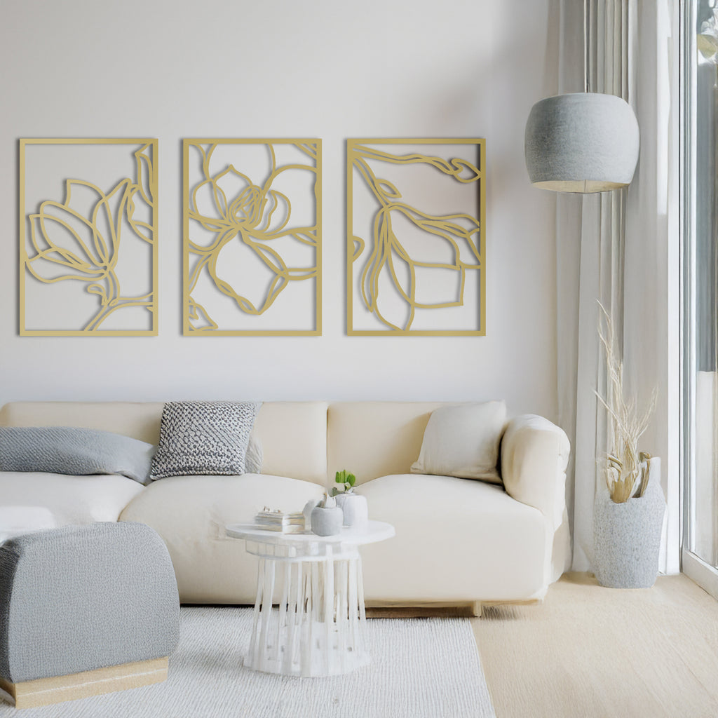 Living room with beige sofa, gold floral line art 3-panel wall decor.