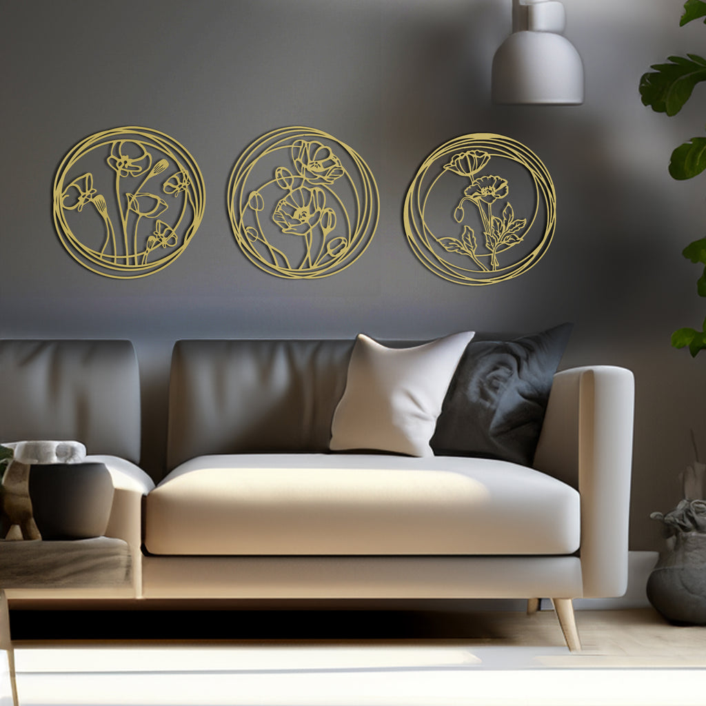 3-piece gold floral metal wall art set displayed in modern bedroom