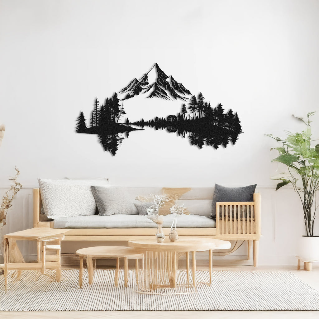 Black forest and mountain wall decor above sofa with cabin and trees