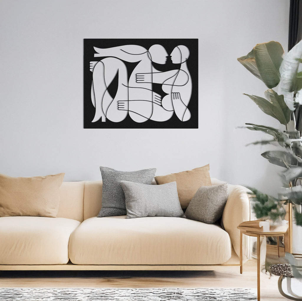 Give a Hug black metal wall art featuring abstract couple silhouette in embrace – wall mounted view