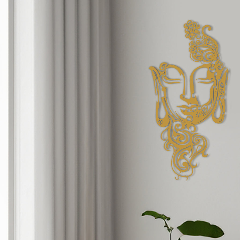 Golden Buddha face metal wall art hanging in modern home interior by Hencely