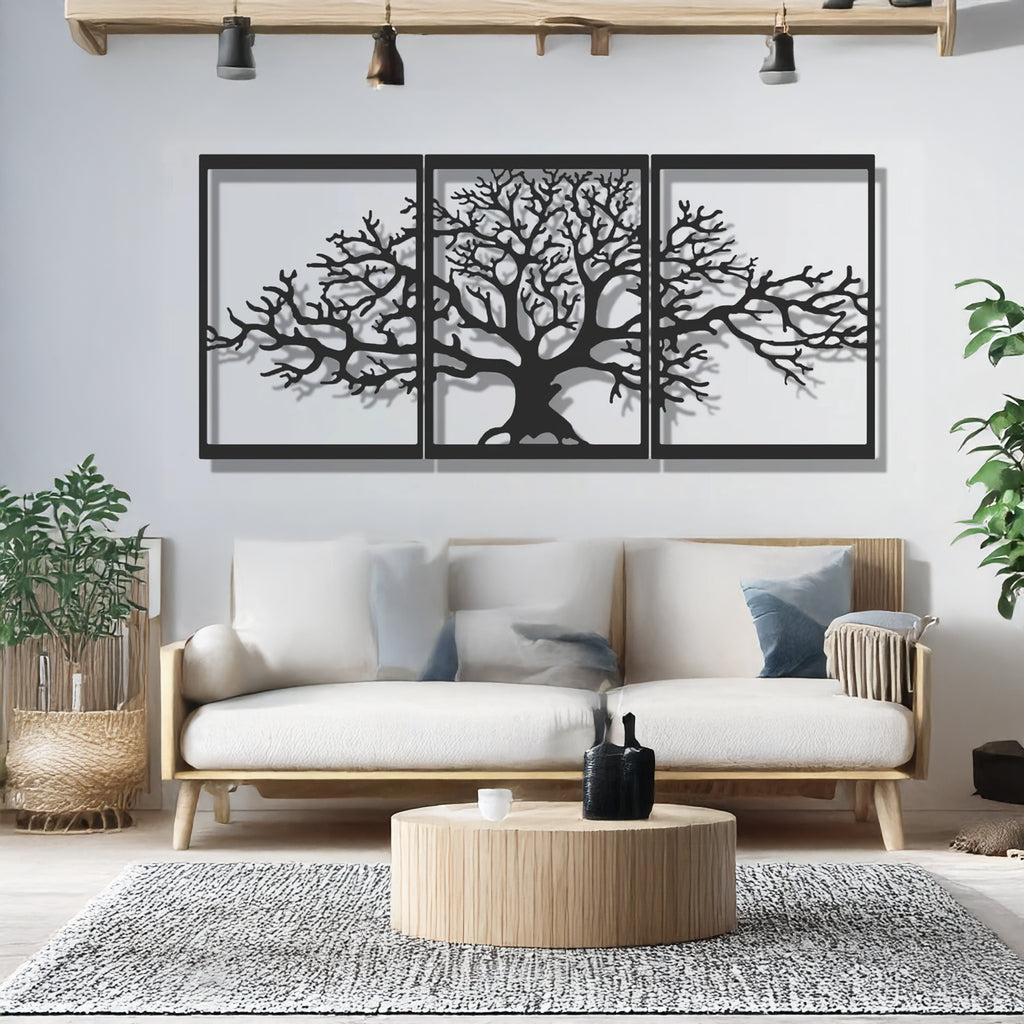 Close-up of laser-cut branches on matte black Tree of Life wall art panels
