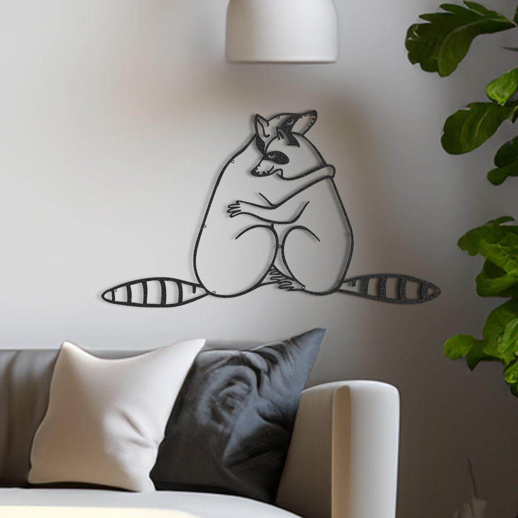 Hugging raccoons line art metal wall decor in black on living room wall