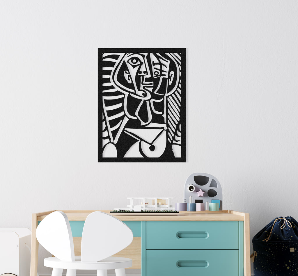 Front view of cubist face design metal wall art with bold geometric lines