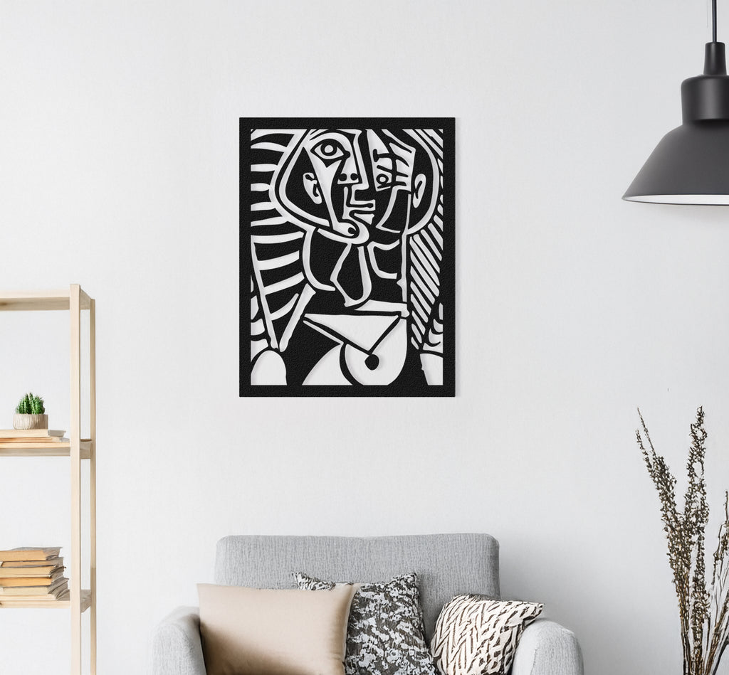 Abstract Picasso-inspired metal wall art in cubist face design displayed above modern sofa